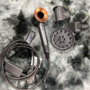(Sold) Dyson Supersonic HD07 hairdryer Nickel/ Copper